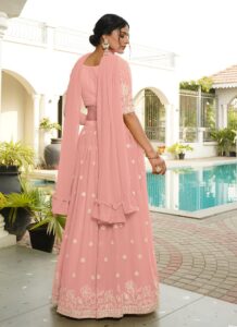 Pink faux georgette umbrella lehenga choli with thread embroidery and sequins back view