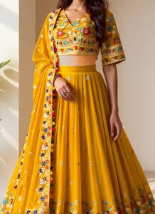 Yellow sequin umbrella-cut lehenga choli with attached dupatta side view